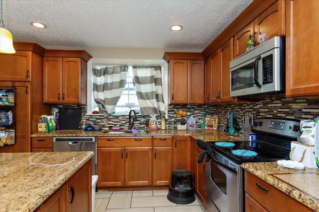 52 CATTLE TRAIL DRIVE, HAINES CITY, Florida 33844, 5 Bedrooms Bedrooms, ,2 BathroomsBathrooms,Residential,For Sale,CATTLE TRAIL,S5062227