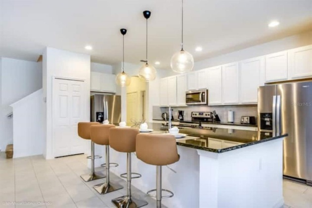 7013 OAKWOOD STREET, DAVENPORT, Florida 33837, 14 Bedrooms Bedrooms, ,10 BathroomsBathrooms,Residential,For Sale,OAKWOOD,T3354677