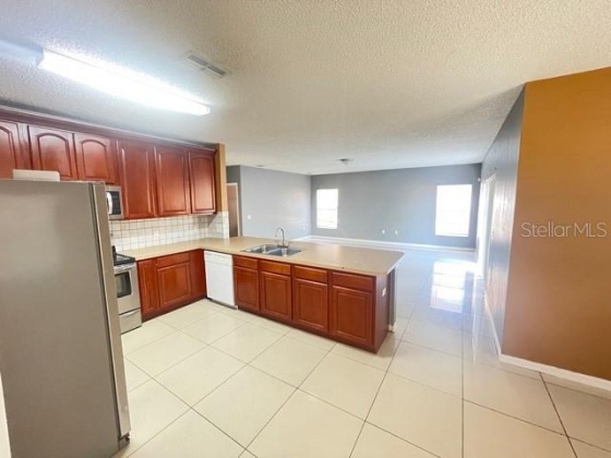 1403 KISSIMMEE COURT, POINCIANA, Florida 34759, 4 Bedrooms Bedrooms, ,2 BathroomsBathrooms,Residential,For Sale,KISSIMMEE,O5960119