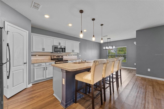 1264 HAINES DRIVE, WINTER HAVEN, Florida 33881, 4 Bedrooms Bedrooms, ,2 BathroomsBathrooms,Residential,For Sale,HAINES,S5062387
