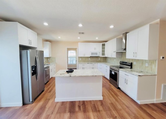 144 LAKE RING DRIVE, WINTER HAVEN, Florida 33884, 3 Bedrooms Bedrooms, ,2 BathroomsBathrooms,Residential,For Sale,LAKE RING,S5063711