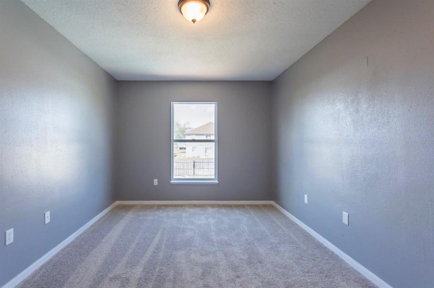 5821 WINDRIDGE DRIVE, WINTER HAVEN, Florida 33881, 5 Bedrooms Bedrooms, ,3 BathroomsBathrooms,Residential,For Sale,WINDRIDGE,O6007783