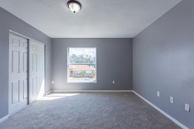 5821 WINDRIDGE DRIVE, WINTER HAVEN, Florida 33881, 5 Bedrooms Bedrooms, ,3 BathroomsBathrooms,Residential,For Sale,WINDRIDGE,O6007783