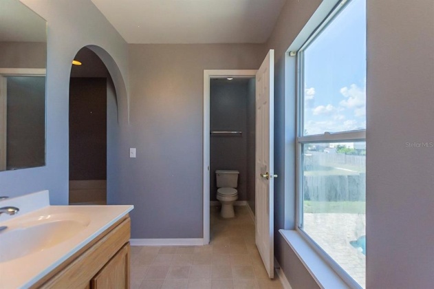 5821 WINDRIDGE DRIVE, WINTER HAVEN, Florida 33881, 5 Bedrooms Bedrooms, ,3 BathroomsBathrooms,Residential,For Sale,WINDRIDGE,O6007783