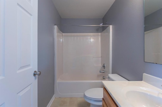 5821 WINDRIDGE DRIVE, WINTER HAVEN, Florida 33881, 5 Bedrooms Bedrooms, ,3 BathroomsBathrooms,Residential,For Sale,WINDRIDGE,O6007783