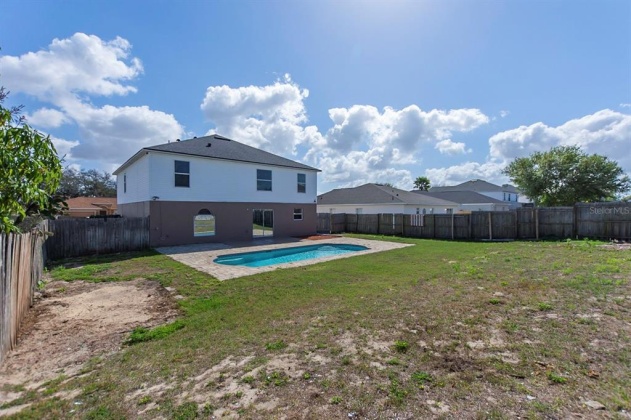 5821 WINDRIDGE DRIVE, WINTER HAVEN, Florida 33881, 5 Bedrooms Bedrooms, ,3 BathroomsBathrooms,Residential,For Sale,WINDRIDGE,O6007783