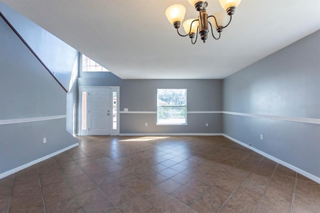 5821 WINDRIDGE DRIVE, WINTER HAVEN, Florida 33881, 5 Bedrooms Bedrooms, ,3 BathroomsBathrooms,Residential,For Sale,WINDRIDGE,O6007783