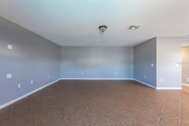5821 WINDRIDGE DRIVE, WINTER HAVEN, Florida 33881, 5 Bedrooms Bedrooms, ,3 BathroomsBathrooms,Residential,For Sale,WINDRIDGE,O6007783