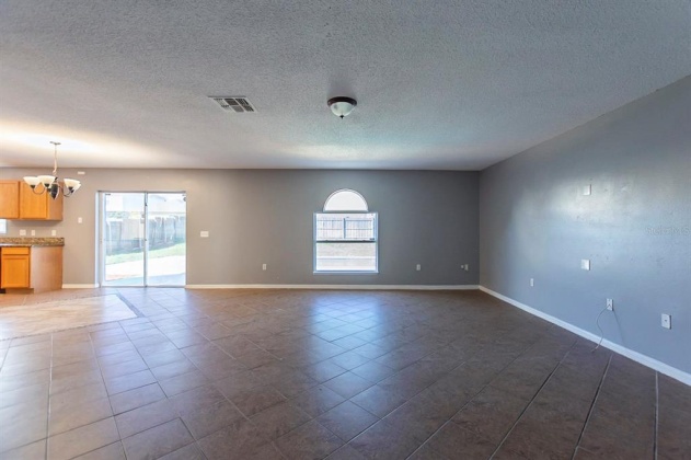 5821 WINDRIDGE DRIVE, WINTER HAVEN, Florida 33881, 5 Bedrooms Bedrooms, ,3 BathroomsBathrooms,Residential,For Sale,WINDRIDGE,O6007783