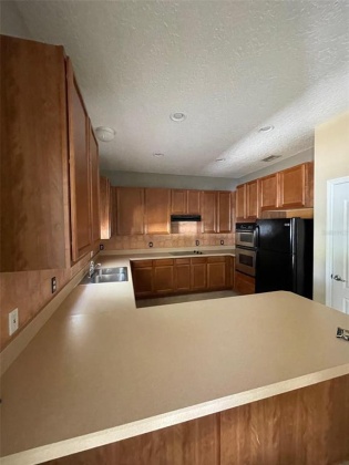 322 CASSIA DRIVE, DAVENPORT, Florida 33897, 3 Bedrooms Bedrooms, ,2 BathroomsBathrooms,Rental Properties,For Sale,CASSIA,G5052384