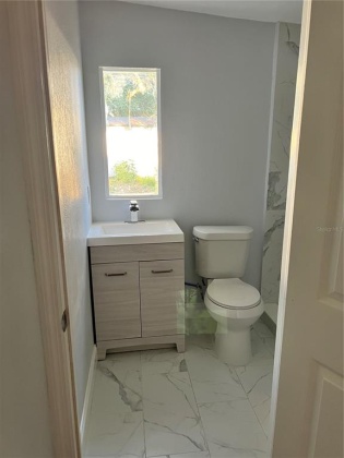 105 LAKE RING DRIVE, WINTER HAVEN, Florida 33884, 4 Bedrooms Bedrooms, ,2 BathroomsBathrooms,Residential,For Sale,LAKE RING,O6008182