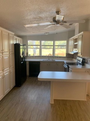 8937 GOLDEN GATE BOULEVARD, POLK CITY, Florida 33868, 2 Bedrooms Bedrooms, ,2 BathroomsBathrooms,Residential,For Sale,GOLDEN GATE,L4928394