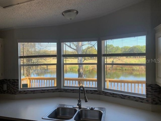 8937 GOLDEN GATE BOULEVARD, POLK CITY, Florida 33868, 2 Bedrooms Bedrooms, ,2 BathroomsBathrooms,Residential,For Sale,GOLDEN GATE,L4928394