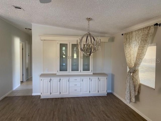 8937 GOLDEN GATE BOULEVARD, POLK CITY, Florida 33868, 2 Bedrooms Bedrooms, ,2 BathroomsBathrooms,Residential,For Sale,GOLDEN GATE,L4928394