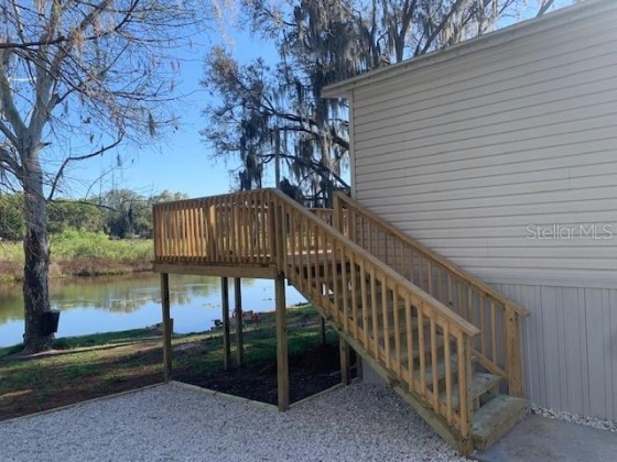 8937 GOLDEN GATE BOULEVARD, POLK CITY, Florida 33868, 2 Bedrooms Bedrooms, ,2 BathroomsBathrooms,Residential,For Sale,GOLDEN GATE,L4928394