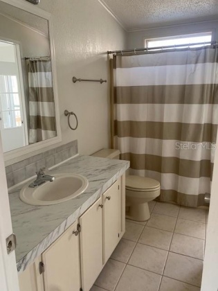 8937 GOLDEN GATE BOULEVARD, POLK CITY, Florida 33868, 2 Bedrooms Bedrooms, ,2 BathroomsBathrooms,Residential,For Sale,GOLDEN GATE,L4928394