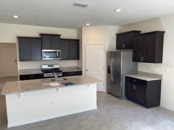 7809 OAK REFLECTION LOOP, DAVENPORT, Florida 33837, 7 Bedrooms Bedrooms, ,6 BathroomsBathrooms,Rental Properties,For Sale,OAK REFLECTION,O6007341