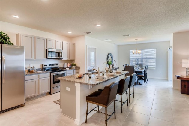 1549 LEAMINGTON LANE, WINTER HAVEN, Florida 33884, 3 Bedrooms Bedrooms, ,2 BathroomsBathrooms,Residential,For Sale,LEAMINGTON,O6008815
