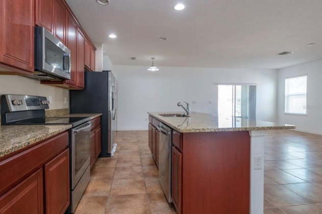1042 SUFFRAGETTE CIRCLE, HAINES CITY, Florida 33844, 3 Bedrooms Bedrooms, ,2 BathroomsBathrooms,Rental Properties,For Sale,SUFFRAGETTE,O6008119