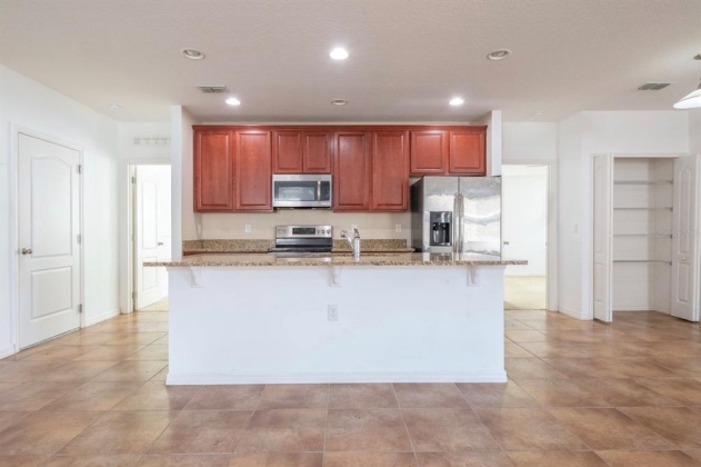 1042 SUFFRAGETTE CIRCLE, HAINES CITY, Florida 33844, 3 Bedrooms Bedrooms, ,2 BathroomsBathrooms,Rental Properties,For Sale,SUFFRAGETTE,O6008119