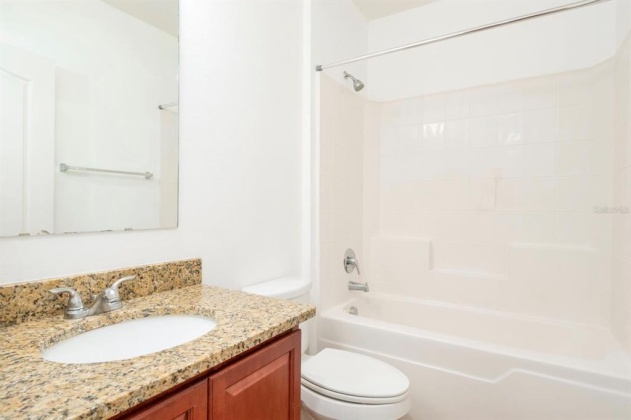 1042 SUFFRAGETTE CIRCLE, HAINES CITY, Florida 33844, 3 Bedrooms Bedrooms, ,2 BathroomsBathrooms,Rental Properties,For Sale,SUFFRAGETTE,O6008119