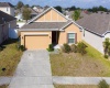 1042 SUFFRAGETTE CIRCLE, HAINES CITY, Florida 33844, 3 Bedrooms Bedrooms, ,2 BathroomsBathrooms,Rental Properties,For Sale,SUFFRAGETTE,O6008119