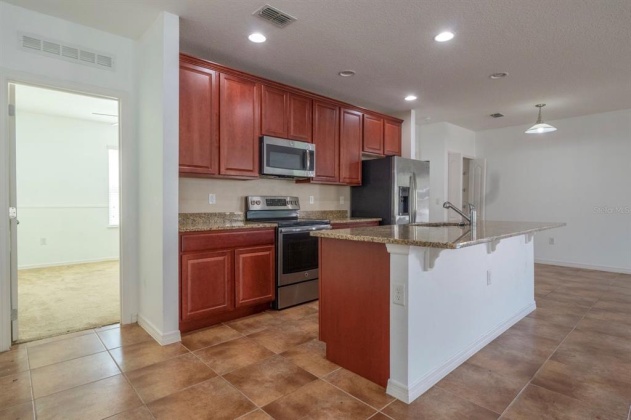 1042 SUFFRAGETTE CIRCLE, HAINES CITY, Florida 33844, 3 Bedrooms Bedrooms, ,2 BathroomsBathrooms,Rental Properties,For Sale,SUFFRAGETTE,O6008119
