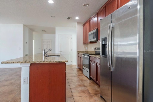 1042 SUFFRAGETTE CIRCLE, HAINES CITY, Florida 33844, 3 Bedrooms Bedrooms, ,2 BathroomsBathrooms,Rental Properties,For Sale,SUFFRAGETTE,O6008119