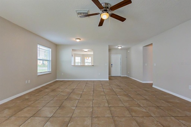 5018 HARVEST DRIVE, HAINES CITY, Florida 33844, 3 Bedrooms Bedrooms, ,2 BathroomsBathrooms,Residential,For Sale,HARVEST,O6009784