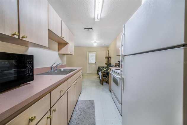 1206 MOSS AVENUE, HAINES CITY, Florida 33844, 3 Bedrooms Bedrooms, ,2 BathroomsBathrooms,Residential,For Sale,MOSS,P4919543