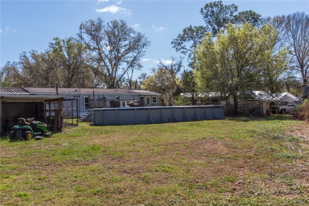 4214 WOODSRIDGE DRIVE, POLK CITY, Florida 33868, 3 Bedrooms Bedrooms, ,2 BathroomsBathrooms,Residential,For Sale,WOODSRIDGE,P4919675
