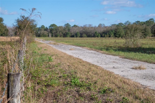 6780 SUGARBUSH LANE, POLK CITY, Florida 33868, 4 Bedrooms Bedrooms, ,2 BathroomsBathrooms,Residential,For Sale,SUGARBUSH,T3351615