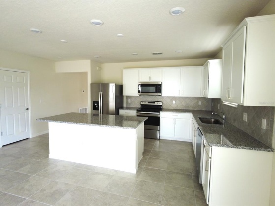 514 CITRUS ISLE BLVD, DAVENPORT, Florida 33837, 4 Bedrooms Bedrooms, ,2 BathroomsBathrooms,Rental Properties,For Sale,CITRUS ISLE BLVD,O6010531