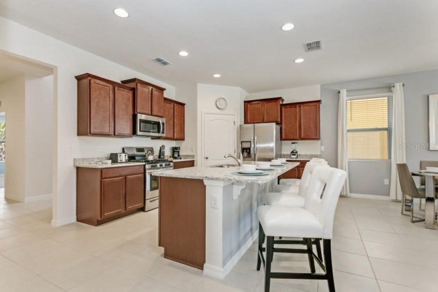 7036 OAKWOOD STREET, DAVENPORT, Florida 33837, 7 Bedrooms Bedrooms, ,5 BathroomsBathrooms,Residential,For Sale,OAKWOOD,S5064459
