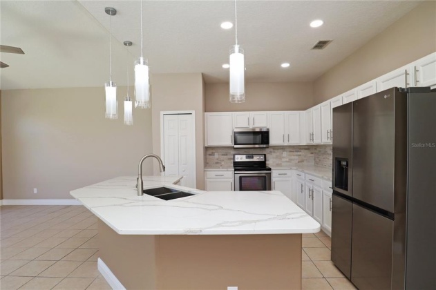 1014 CORVINA DRIVE, DAVENPORT, Florida 33897, 5 Bedrooms Bedrooms, ,3 BathroomsBathrooms,Residential,For Sale,CORVINA,O6012168
